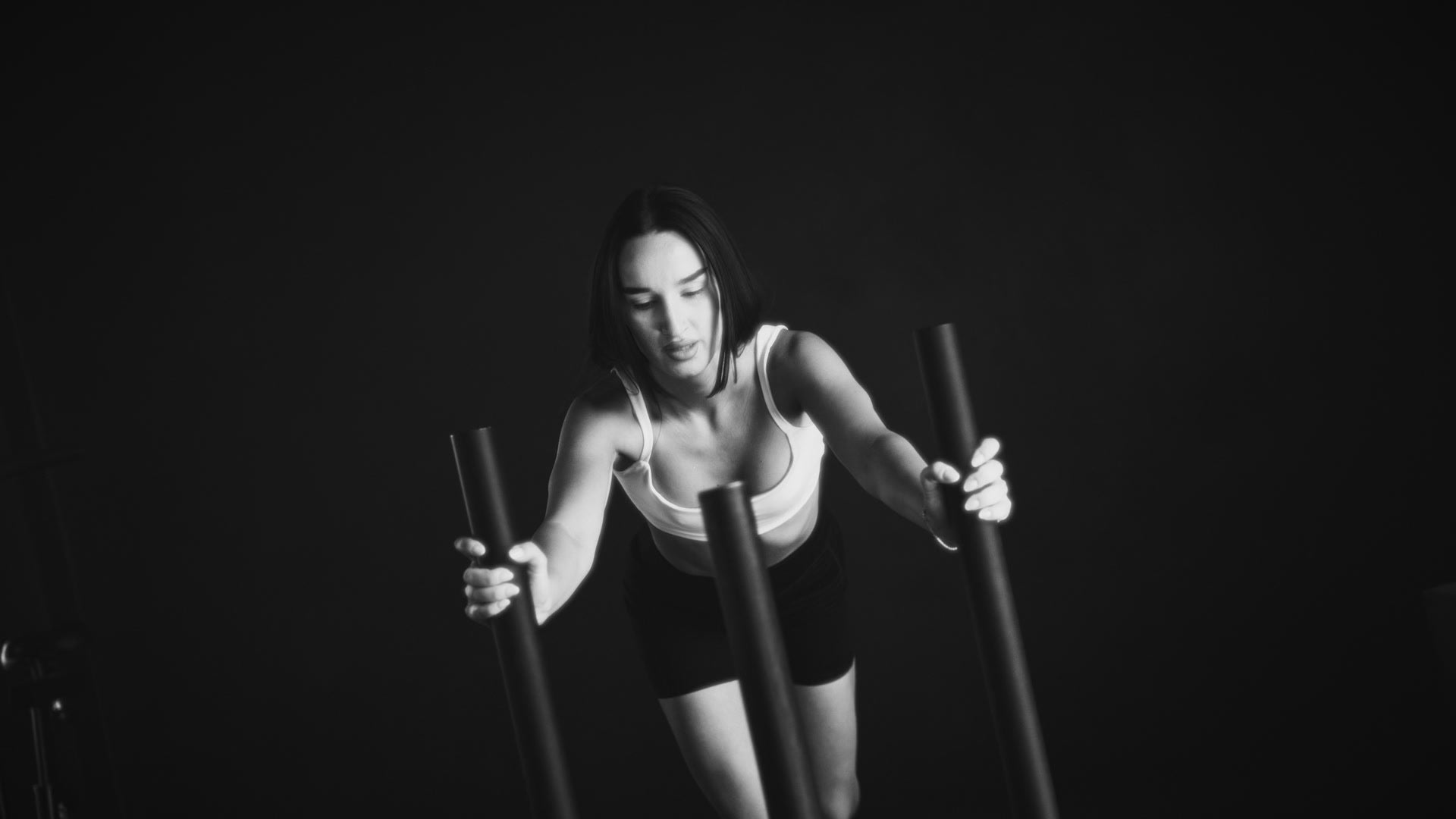 Athlete pushing a training sled
